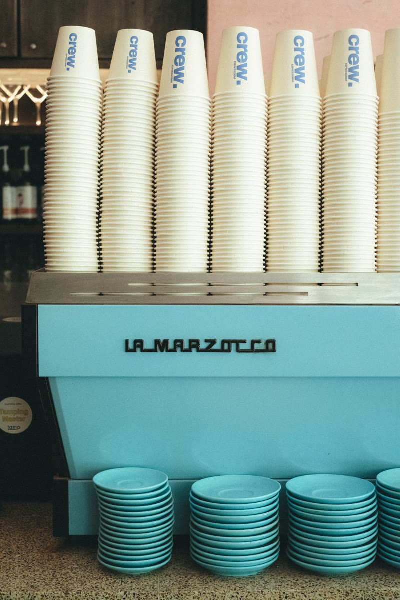 La Marzocco espresso machine brewing Veneziano coffee at Crew Espresso Bar Canberra